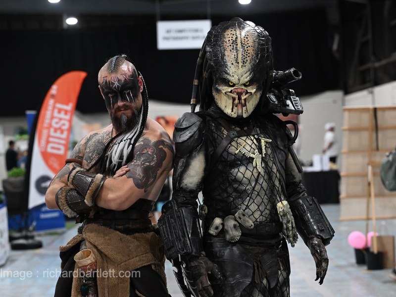 Predator and viking cosplayers on the show floor