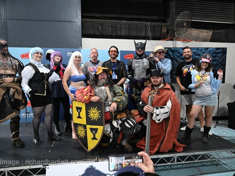 Cosplay showcase contestants on stage at Newy-Con